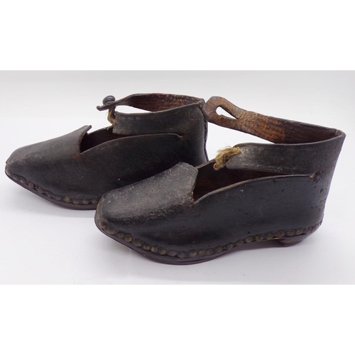 1416 - A pair of 19th century child's shoes - North Country, with leather uppers, timber soles and ironwork... 