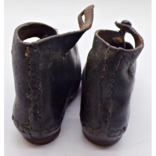 1416 - A pair of 19th century child's shoes - North Country, with leather uppers, timber soles and ironwork... 