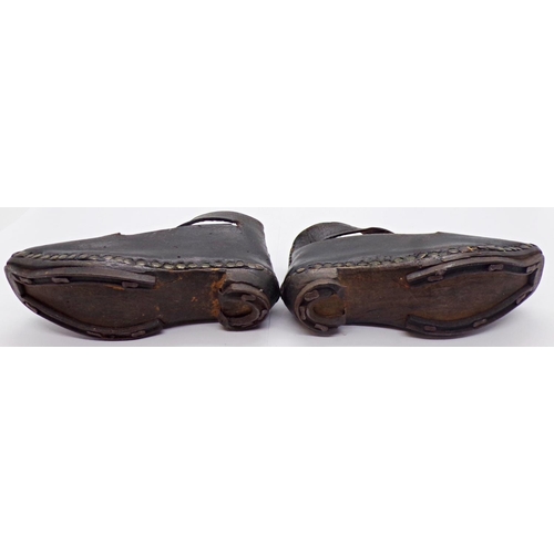 1416 - A pair of 19th century child's shoes - North Country, with leather uppers, timber soles and ironwork... 