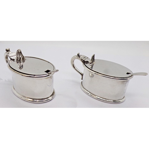 1419 - Pair of 19th century gold plated lunettes and two silver plated mustard pots of oval form, both with... 