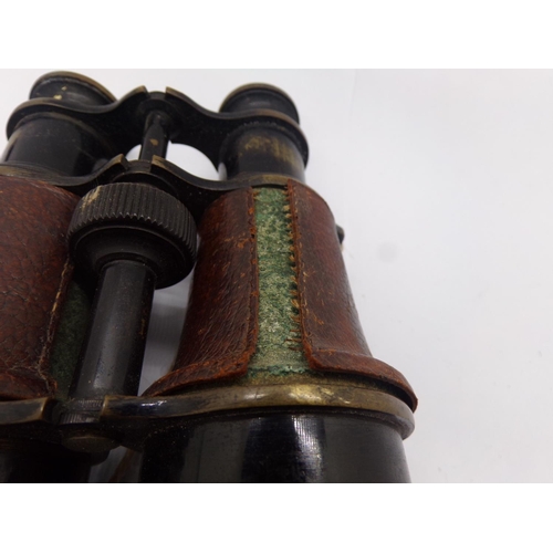 1421 - A pair of WWI military binoculars, together with WWII defence medal,  39-45 War Medal