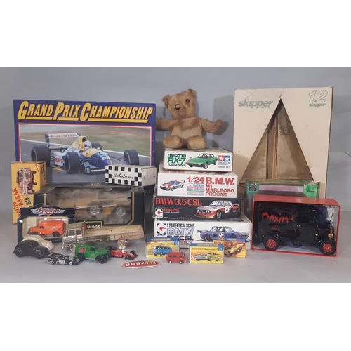 348 - Mixed lot: 4 boxed model car kits  which appear un-started comprising Mazda Savannah by Tamiya, BMW ... 