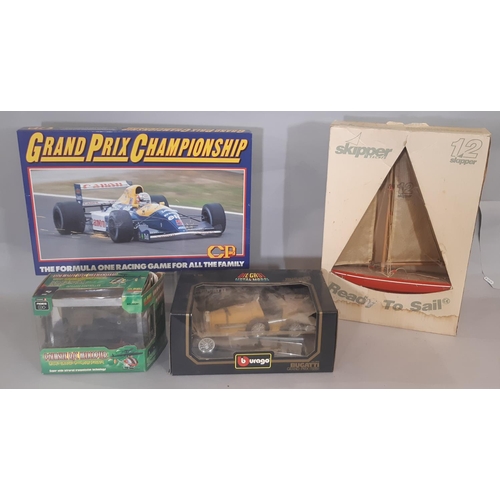 348 - Mixed lot: 4 boxed model car kits  which appear un-started comprising Mazda Savannah by Tamiya, BMW ... 