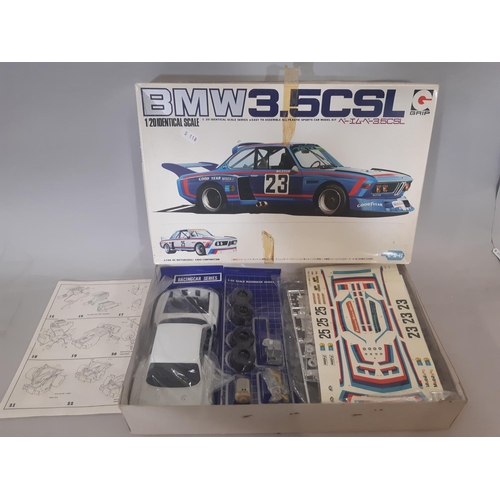 348 - Mixed lot: 4 boxed model car kits  which appear un-started comprising Mazda Savannah by Tamiya, BMW ... 