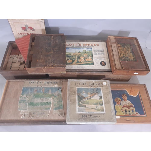 336 - Early 20th century building brick sets; 4 box sets of Lott's Bricks circa 1920 including Box A and B... 