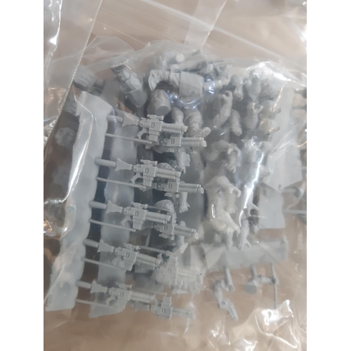 346 - Warhammer type game modelling pieces comprising 31 bags of miniature parts for creating armies and w... 