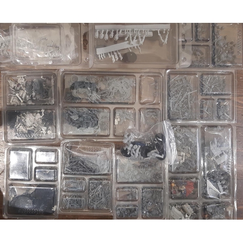 338 - Large quantity of unsorted modelling parts for creating Warhammer type figures including some comple... 