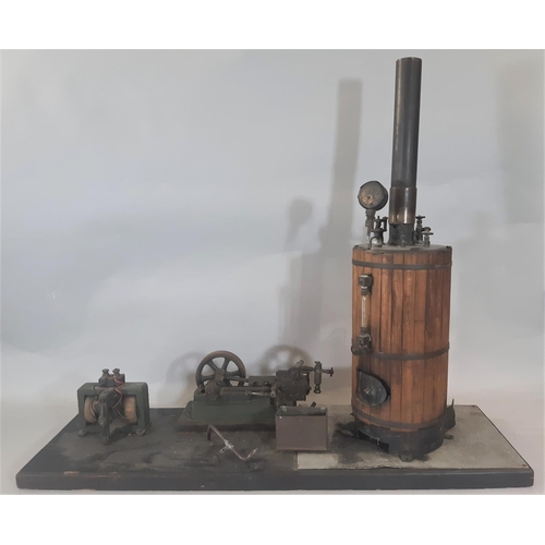 356 - A vintage vertical live steam boiler and stationary single flywheel horizontal engine on platform ba... 