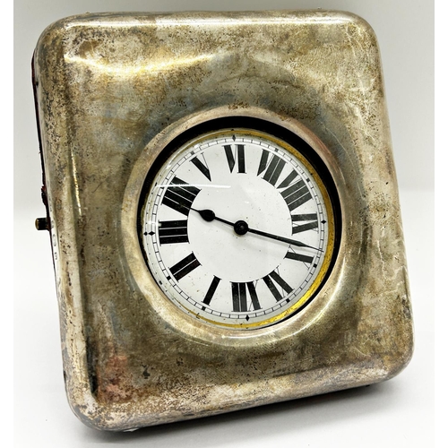 1381 - A silver mounted travelling watch case holding a silver plated cased watch with enamelled dial, the ... 