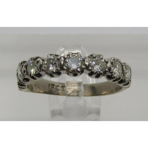 1329 - 18ct white gold diamond half hoop ring, set with eight stones each 0.15ct approx, size L, 3.1g