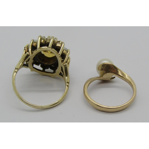 1341 - 9ct citrine and pearl cluster ring, size N and a further 9ct pearl crossover ring, size H/I, 7.2g to... 