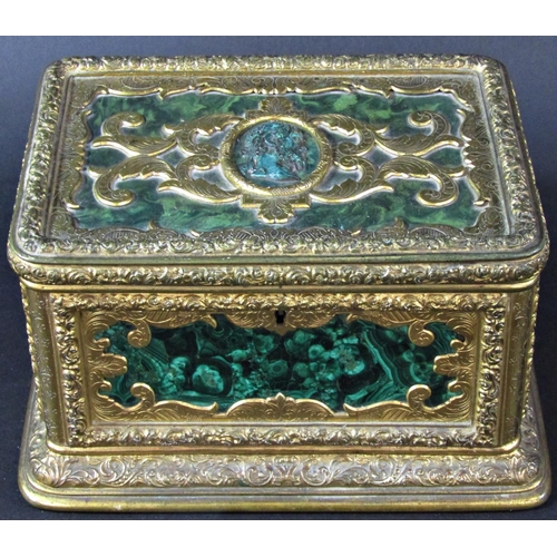 1430 - A fine quality antique casket, the engraved gilded framework enclosing malachite panels, to the cent... 