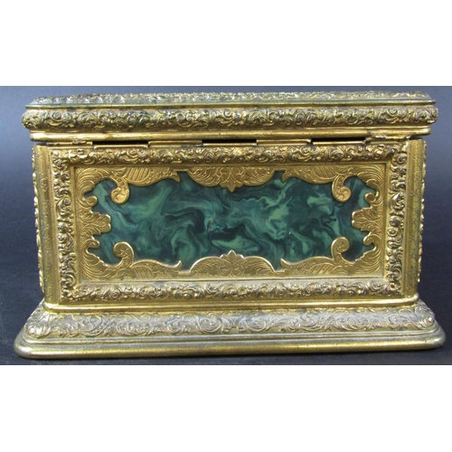 1430 - A fine quality antique casket, the engraved gilded framework enclosing malachite panels, to the cent... 