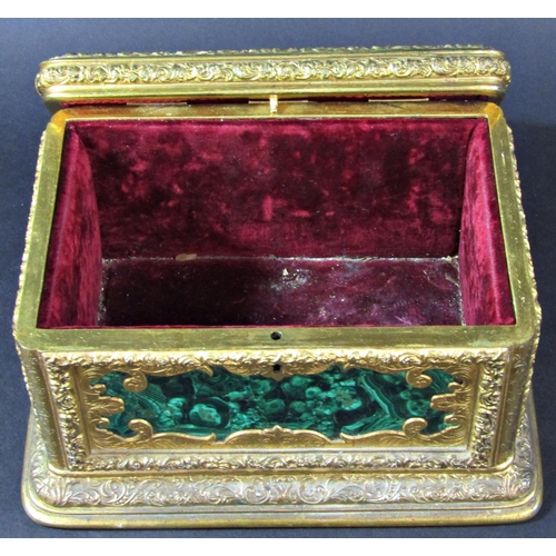 1430 - A fine quality antique casket, the engraved gilded framework enclosing malachite panels, to the cent... 