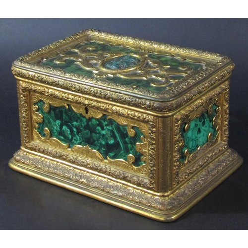 1430 - A fine quality antique casket, the engraved gilded framework enclosing malachite panels, to the cent... 