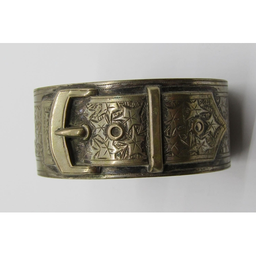 1363 - Aesthetic Movement silver hinged cuff bangle, together with a further silver plated belt design exam... 