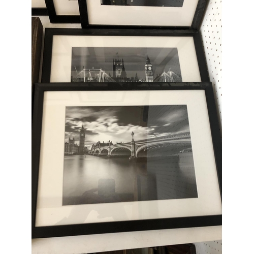 100 - NINETEEN FRAMED WORKS: including seven framed black and white photographs of London by Barbara Chand... 