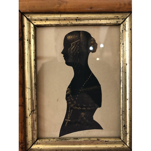 109 - English School, 19th Century - silhouette of a lady, paper-cut with gilt details, 16 x 19 cm (includ... 