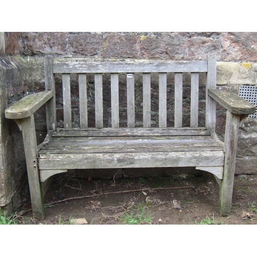 2048 - A vintage weathered teak two seat garden bench with slatted seat and back, 125 cm wide (af)