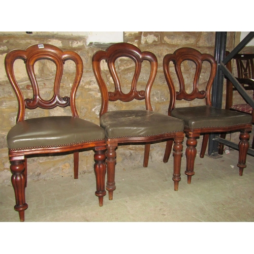 2153 - A Harlequin set of six similar Victorian walnut balloon back dining chairs with moulded frames, upho... 