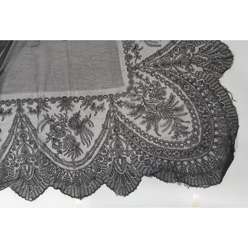 1645 - 19th century black lace Spanish mantilla, approx 185x185cm. With note from vendor regarding its hist... 