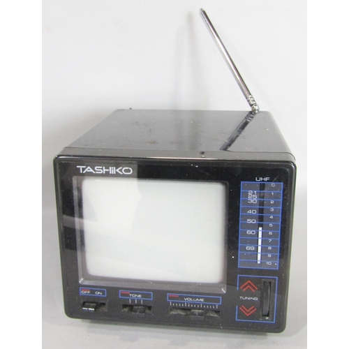 1491 - A Tashiko portable B/W television in its original box, an early example of a Sony Walkman, a Sinclai... 