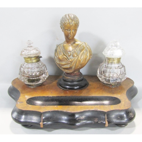 1495 - A 19th century desk top pen and ink stand with a central bust of a woman flanked by inkwells and two... 