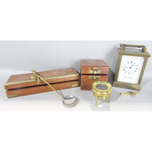 1500 - A 19th century walnut writing slope and a 19th century rosewood travelling vanity box, a brass carri... 