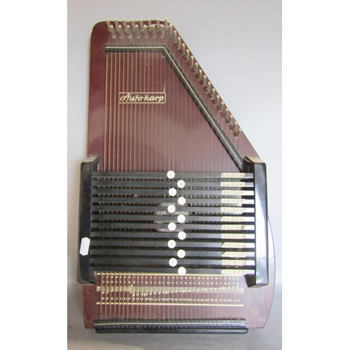 1516 - A boxed Akkord musical instrument together with an auto harp