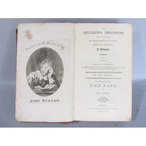 1521 - A miscellaneous collection of items including a copy of Milton Pilgrims Progress, a Triumph motorcyc... 