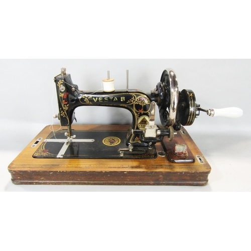 1461 - A Vesta model B sewing machine, circa 1920’s, in it’s original wooden case, an antique Gresham sewin... 