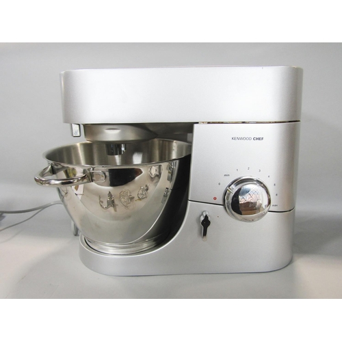 1464 - A Kenwood Chef food mixer and the Kenwood Chef food processor attachment, an assortment of blades, w... 