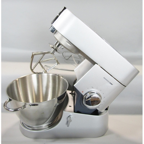 1464 - A Kenwood Chef food mixer and the Kenwood Chef food processor attachment, an assortment of blades, w... 