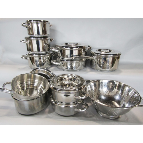 1465 - A set of Aga saucepans and lids to include casseroles and steamer, together with an unrelated coland... 