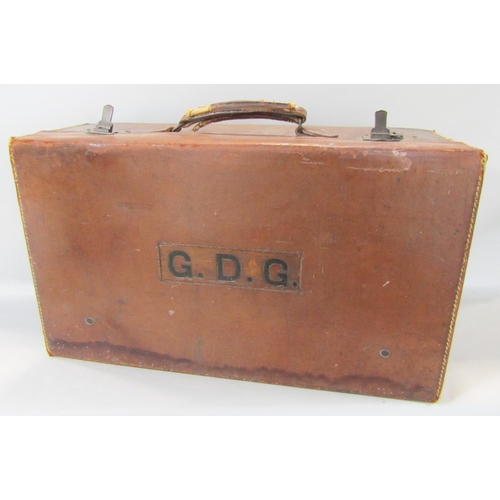 1468 - Two vintage brown leather suitcases and a pair of Rank Aldis binoculars 7 x 50 in a case, strap brok... 