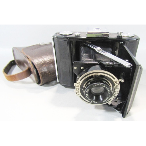 1473 - A Zeiss Contaflex camera circa 1950’s in it’s original case and manual together with associate lens,... 