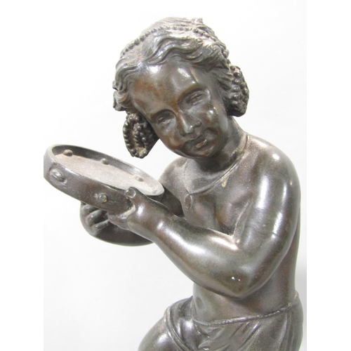 1478 - A spelter statue of a young girl doing a jig and playing a tambourine, raised on a socle base, 32cm ... 