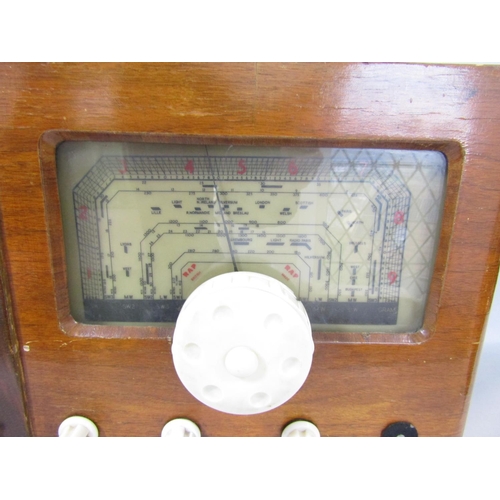 1480 - A vintage RAP wooden cased three band radio with white Bakelite dials, 53cm wide.