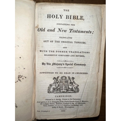 293 - A William IV bible, the dark maroon leather bindings blocked in repeating gothic style architectural... 