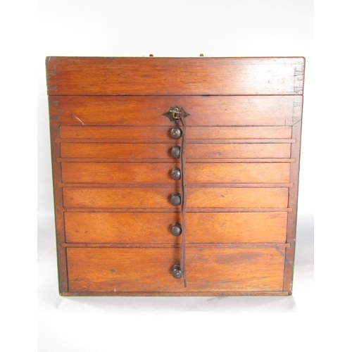 1543 - An Edwardian mahogany dentist’s instrument drawer with a hinged top section containing glass jars, w... 