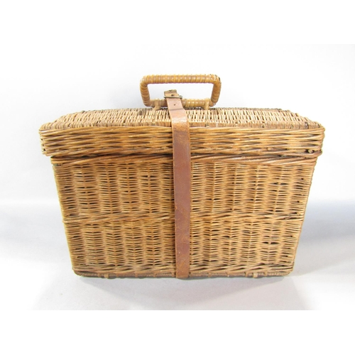 1548 - A vintage travelling picnic set with kettle and burner, sandwich box, etc, in its original wicker ca... 