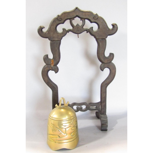 1549 - A small brass Chinese gong hanging from a hardwood frame, 36cm x 18cm.