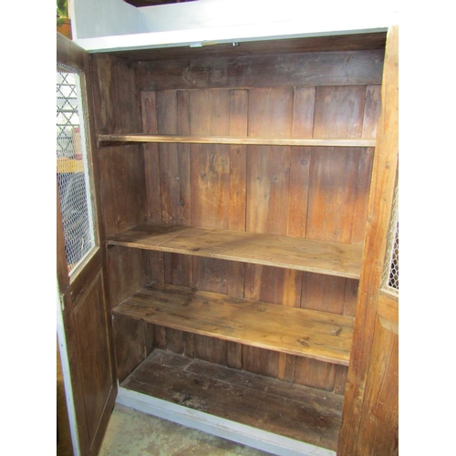 2204 - An antique pine kitchen side cupboard with all over light blue painted and distressed finish, freest... 