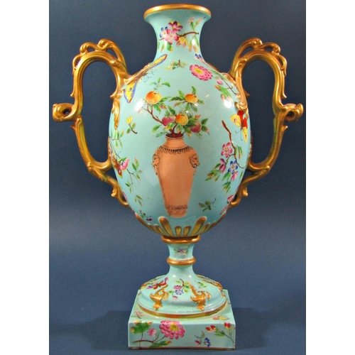 1047A - A Victorian oviform vase in turquoise with panelled detail showing butterflies, moths, floral sprays... 