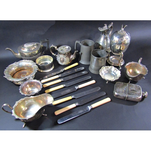 1180 - A good quantity of mixed silver plate consisting of tea services, sauce boats, wine coasters, wine b... 