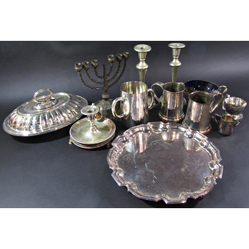 1182 - A selection of silver plated tableware including tureen, a pair of slender candlesticks, tankards, a... 