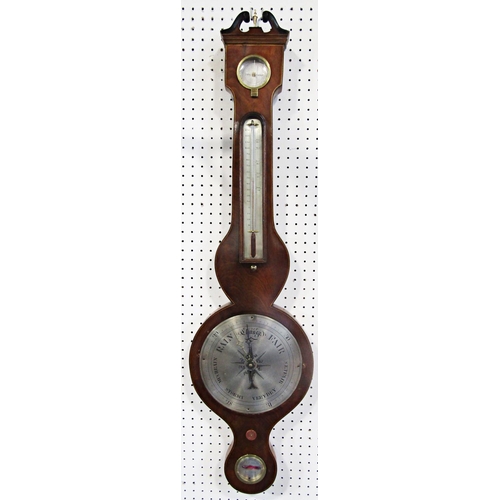 1409 - A Georgian mahogany wheel barometer with silvered dials, I. Sordelli of London, the case work with s... 