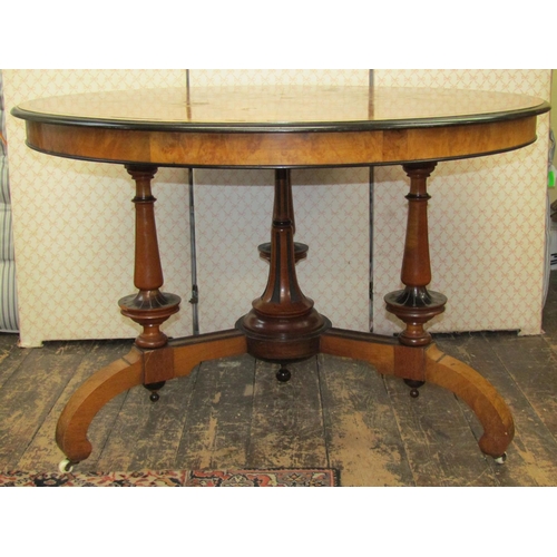 2664 - A circular Victorian walnut and figured walnut centre table, the top quarter veneered and set within... 