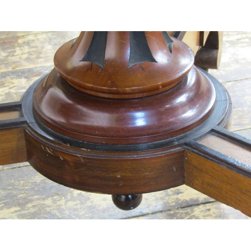 2664 - A circular Victorian walnut and figured walnut centre table, the top quarter veneered and set within... 