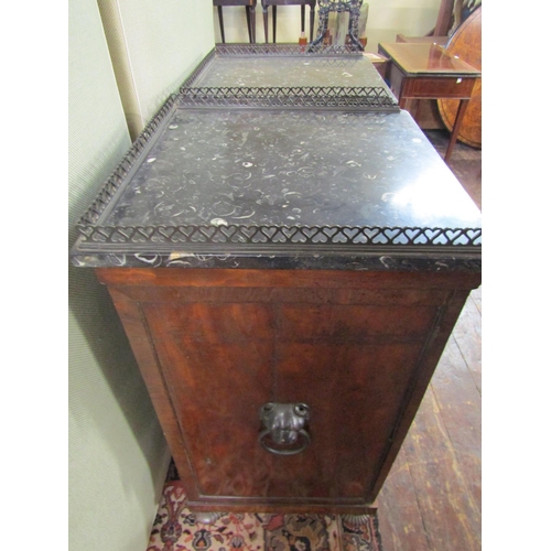 2665 - A pair of Georgian mahogany pedestals of square cut form, set beneath polished marble tops with thre... 